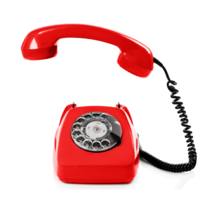 Ein rotes Telefon auf einem Schreibtisch symbolisiert die Notfallfunktion im KOKE Management System